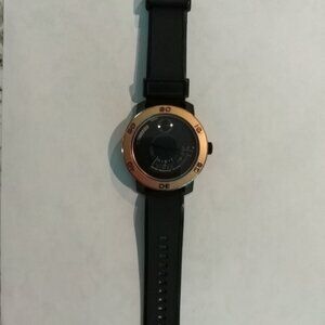 Men's Movado Bold watch (3600360).Black w/Gold bezel w/ honeycomb -texture dial